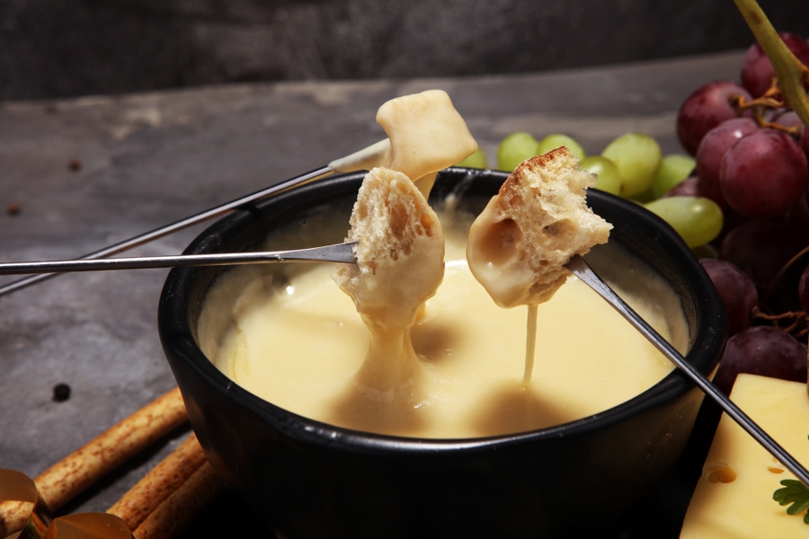 Gourmet Swiss fondue dinner on a winter evening